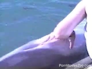 Man finger fucks dolphin and loves the feeling