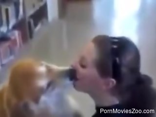 Aroused woman gets intimate with a dog in spicy perversions